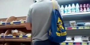 Teen at the supermarket wearing tight shorts