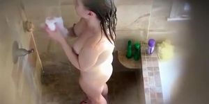 Woman with big rough nipples showering