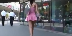Sexy brunette chick short pink dress