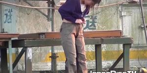 Japanese girl peeing herself up and being filmed by voyeur