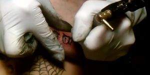 Danish Boy getting a tattoo on his dick