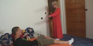 Perverted blonde GILF giving a handjob and a blowjob