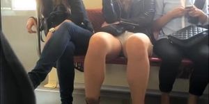 Chick in tight shorts filmed in train