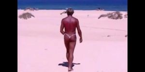 Tanned guy on beach in tiny string thong temporarily (amateur )