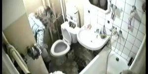 Blonde was caught in the intimate moment of peeing on toilet