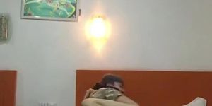 Chinese lesbian tomboy fingers her gf on their bed