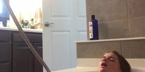 Redhead teen slut cumming in bathtub