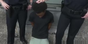 Redhead cop sucks a big black dick