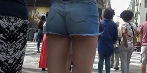 Smoking hot brunette gets her big butt caught on tape