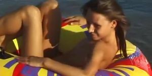 Spy nude girl picked up by voyeur cam at nude beach