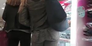 Tight jeans girl at supermarket