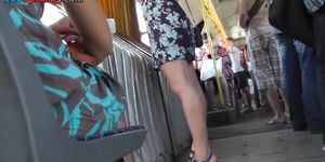 Public upskirt video with sexy MILF in tight dress