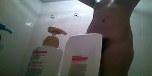 Hairy bush and small boobs woman showering