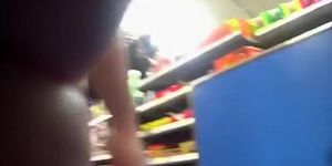 Woman shopping at the local supermarket upskirt