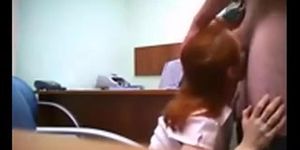 Hidden cam catches redhead in quick office fuck