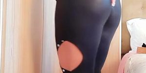 Monica wearing black pants and a buttplug (Monica Santhiago)