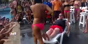 Fat guy gets a wild lap dance from topless girl