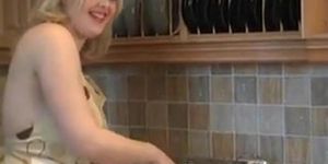 Busty Girl In Kitchen