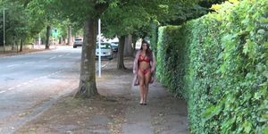 Some horny slut walking around town nude