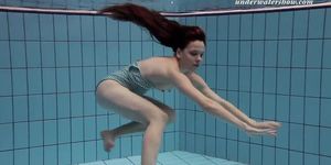Horny Czech girl Salaka swims nude in the Czech pool