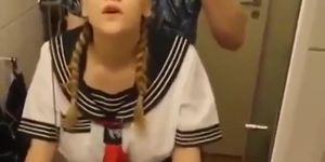 Blonde Schoolgirl in toilet