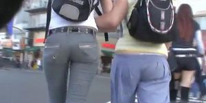 A duo of teen asses followed around the city by a voyeur cam
