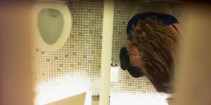 Females get filmed while urinating in the ladies room