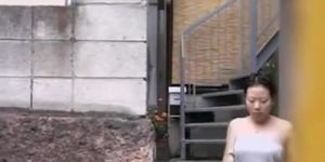 Teen girl gets boob sharking coming down the stairs.