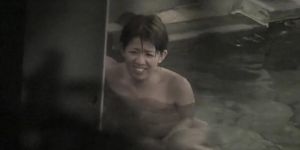 Smiling Asian is in the pool on the voyeur cam video nri104 00