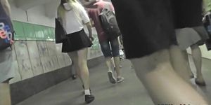 Upskirt footage of g-string of a girl in mini skirt