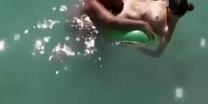 Nudist woman pussy eaten in the water