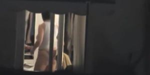 Amateur woman unconsciously provides with window erotica