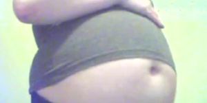 Girl's belly inflates to a large size