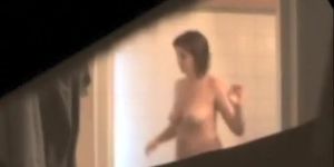 Busty aunt secretly filmed in the bathroom