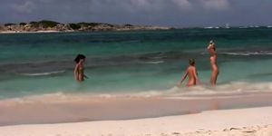 Flawless naked lasses take a dip in the ocean