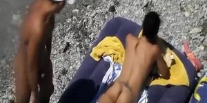 Nudist fucked in air mattress in beach