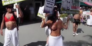 Topless protest on the Miami beach of Florida