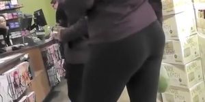 Girl in black leggings and sports shoes
