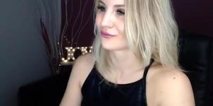 Blonde teases in black dress