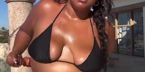 Lizzo Breasts,  Bikini Scene  in Lizzo Puts On Lotion