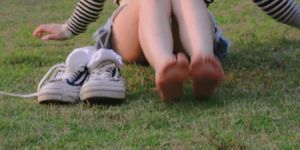 a chinese girl with hot feet in white socks