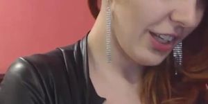 Redhead flashes her breast on webcam