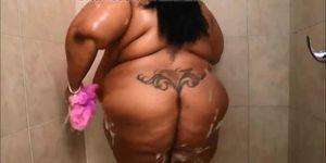 Some very phat ass slut taking a shower