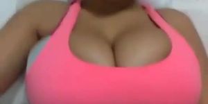 Busty latina jiggling huge boobs