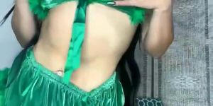 Latina in Christmas outfit on live streaming