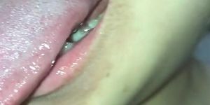 Asian girl brushes her tongue