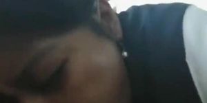 Asian girl sucks cock and swallows cum in a parked car
