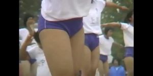 Girls doing gymnastics at a sports day