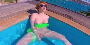 Horny redhead MILF fucks herself in the pool, until dick arrives!