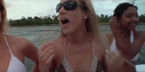 Group of college lesbians licking and fingering each other on a boat
